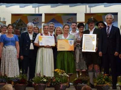 Landeswettbewerb Huglfing und Schönberg Vertreter der Gemeinde Huglfing und Schönberg bei der Siegerehrung
